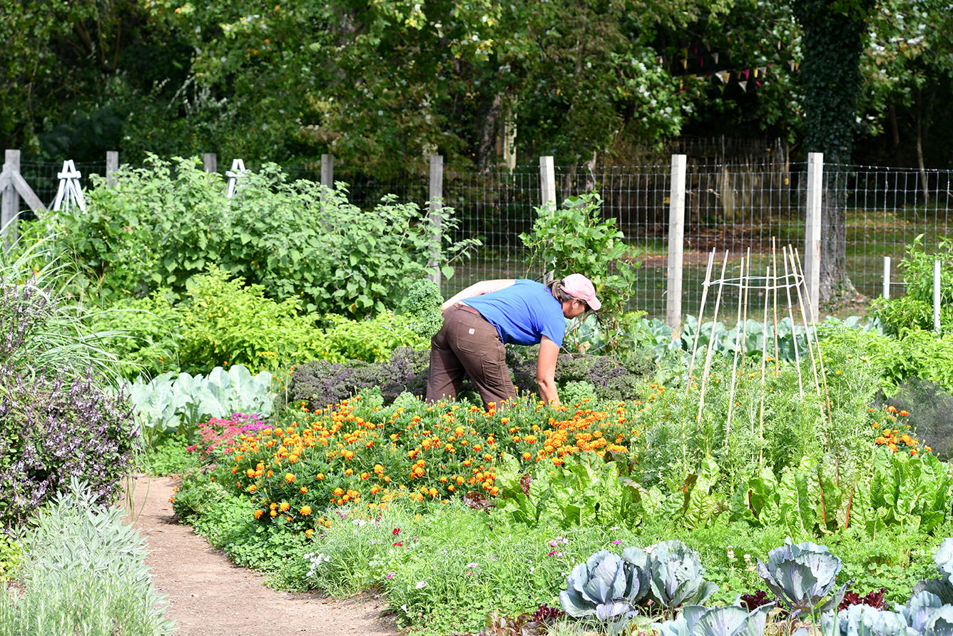 Woman working in a community garden