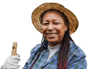 black woman with a straw hat, blue plaid shirt.